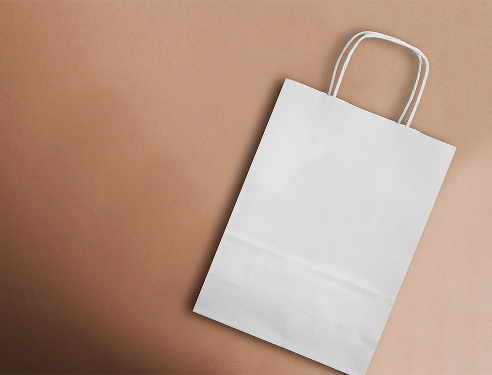BOLSA PAPEL Q-CONNECT CELULOSA BLANCO XS CON ASA RETORCIDA 180X240X80 MM